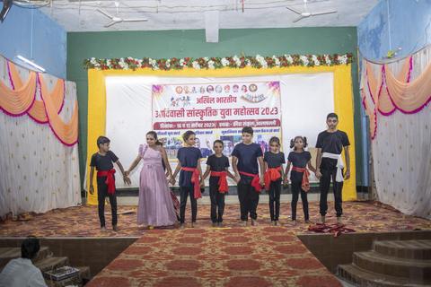 Performers lined up on stage at the festival
